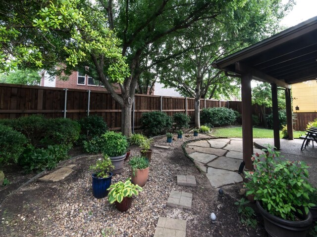 8205 Rayburn Ln, Mckinney, TX 75072 - fenced backyard featuring a patio