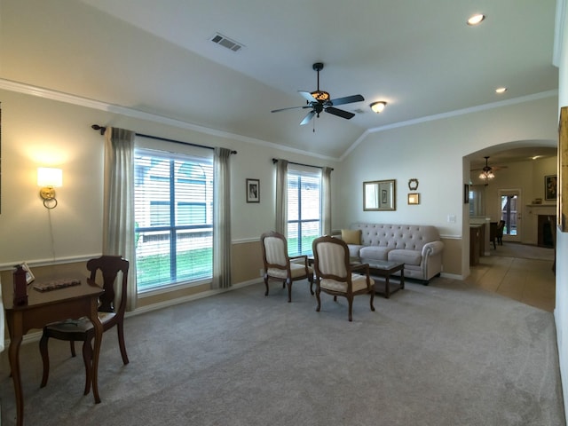 8205 Rayburn Ln, Mckinney, TX 75072 - living room with a ceiling fan, crown molding, light colored carpet, vaulted ceiling, and baseboards
