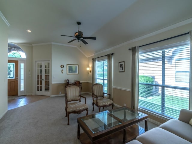 8205 Rayburn Ln, Mckinney, TX 75072 - living area with a ceiling fan, baseboards, crown molding, light colored carpet, and french doors
