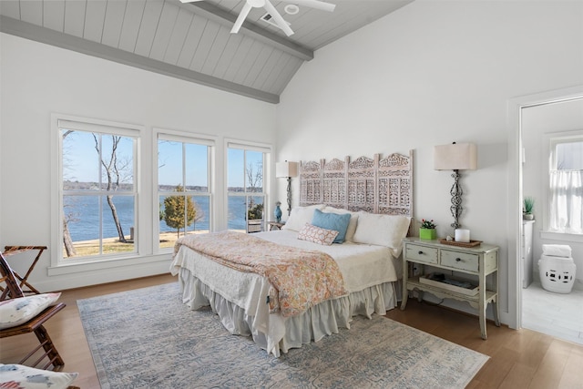 13390 Waterside Dr, Malakoff, TX 75148 - bedroom with wood finished floors, a water view, high vaulted ceiling, and wooden ceiling with exposed beams