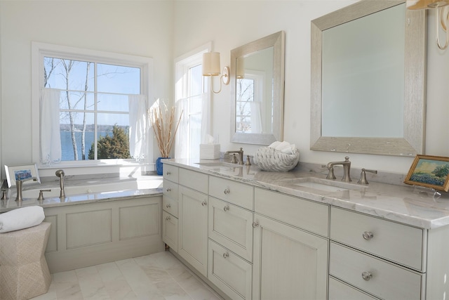 13390 Waterside Dr, Malakoff, TX 75148 - bathroom featuring double vanity, marble finish floors, and a bath