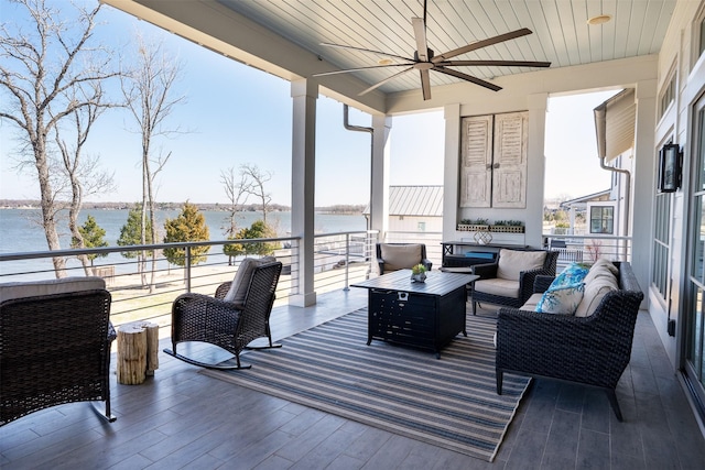 13390 Waterside Dr, Malakoff, TX 75148 - wooden deck with ceiling fan, a water view, and an outdoor living space