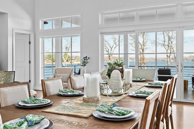 13390 Waterside Dr, Malakoff, TX 75148 - dining area with a water view and a towering ceiling