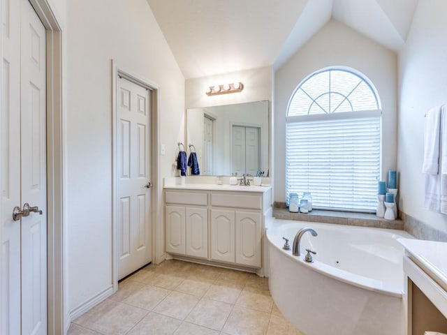 6356 Redeagle Creek Dr, Fort Worth, TX 76179 - full bathroom with lofted ceiling, vanity, a jetted tub, tile patterned flooring, and a closet