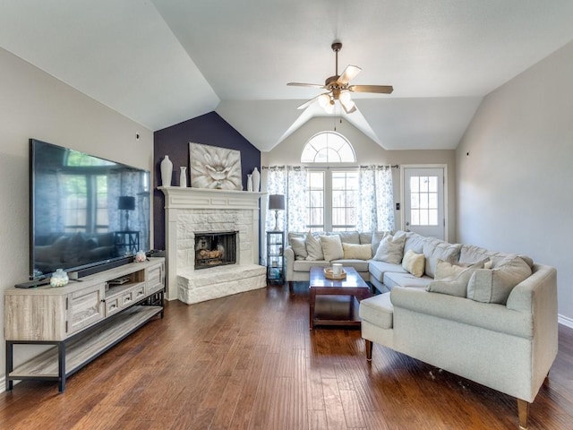 6356 Redeagle Creek Dr, Fort Worth, TX 76179 - living room featuring a ceiling fan, dark wood-type flooring, lofted ceiling, and a stone fireplace