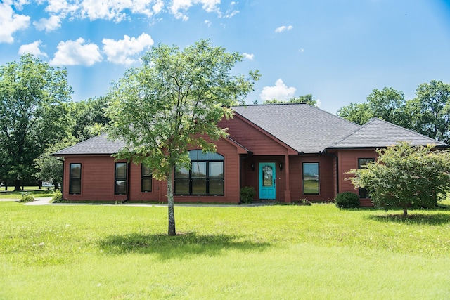 701 N Sulphur St, Dodd City, TX 75438 - view of front of house featuring a shingled roof and a front lawn