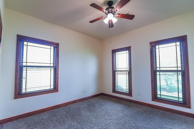 701 N Sulphur St, Dodd City, TX 75438 - empty room featuring carpet, baseboards, and ceiling fan