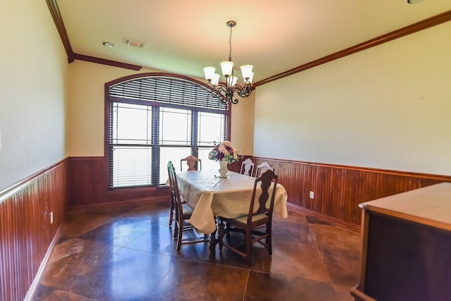 701 N Sulphur St, Dodd City, TX 75438 - dining room with a wainscoted wall, ornamental molding, a chandelier, and wooden walls