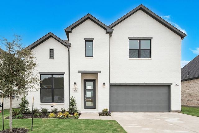 1618 Yorkie Dr, Forney, TX 75126 - view of front of home with an attached garage, brick siding, concrete driveway, and a front lawn