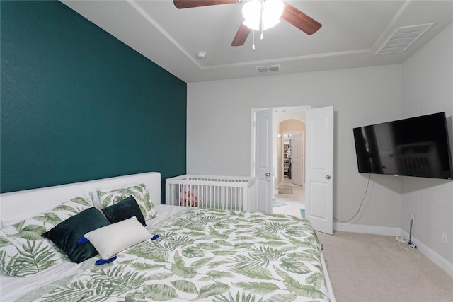 11408 Morrow Ln, Mckinney, TX 75071 - bedroom with light carpet, arched walkways, and ceiling fan