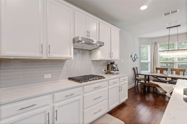 11408 Morrow Ln, Mckinney, TX 75071 - kitchen featuring stainless steel gas cooktop, dark wood-type flooring, white cabinets, decorative backsplash, and under cabinet range hood