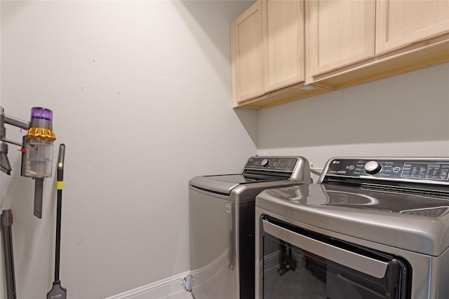 11408 Morrow Ln, Mckinney, TX 75071 - washroom with cabinet space and washing machine and clothes dryer