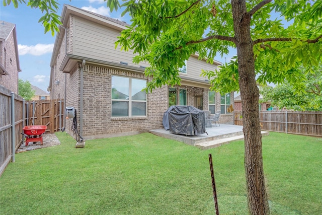 11408 Morrow Ln, Mckinney, TX 75071 - back of house with brick siding, a patio, a fenced backyard, and a gate