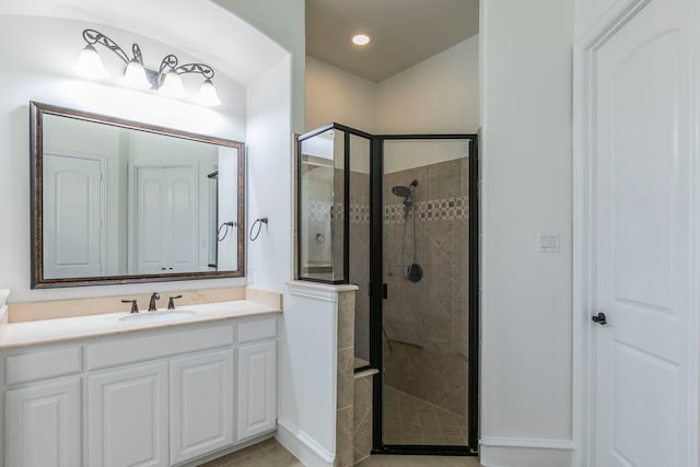 7132 Jernigan Dr, Frisco, TX 75034 - bathroom with a stall shower, vanity, tile patterned floors, and recessed lighting