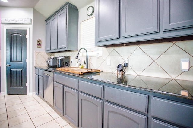 131 Live Oak Ln, Decatur, TX 76234 - kitchen with gray cabinets, dishwasher, tasteful backsplash, and light tile patterned floors