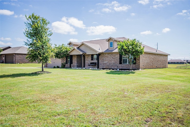 131 Live Oak Ln, Decatur, TX 76234 - view of front of house with brick siding and a front yard