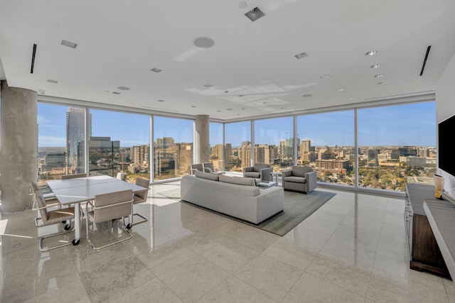 1717 Arts Plz Unit 2303, Dallas, TX 75201 - living area with a wall of windows and light tile patterned floors