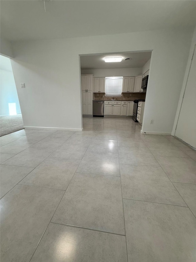 1833 Hood St, Carrollton, TX 75006 - unfurnished living room with baseboards