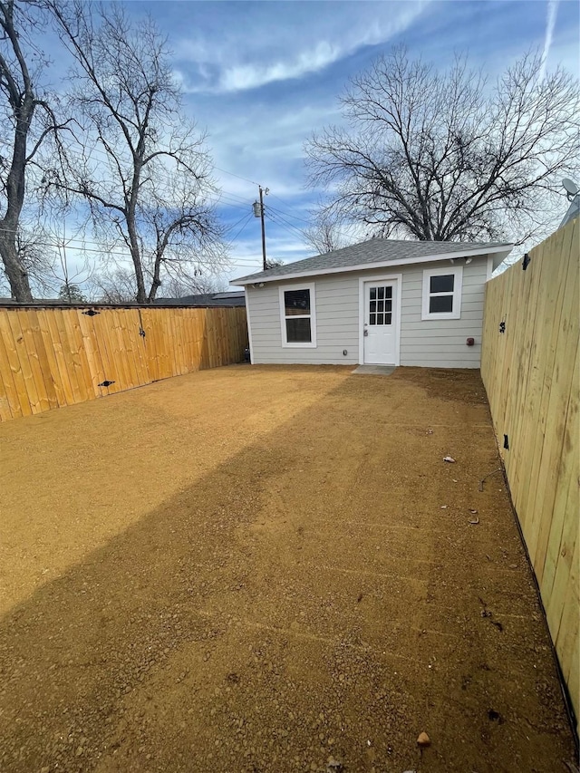 1833 Hood St, Carrollton, TX 75006 - back of property featuring a fenced backyard