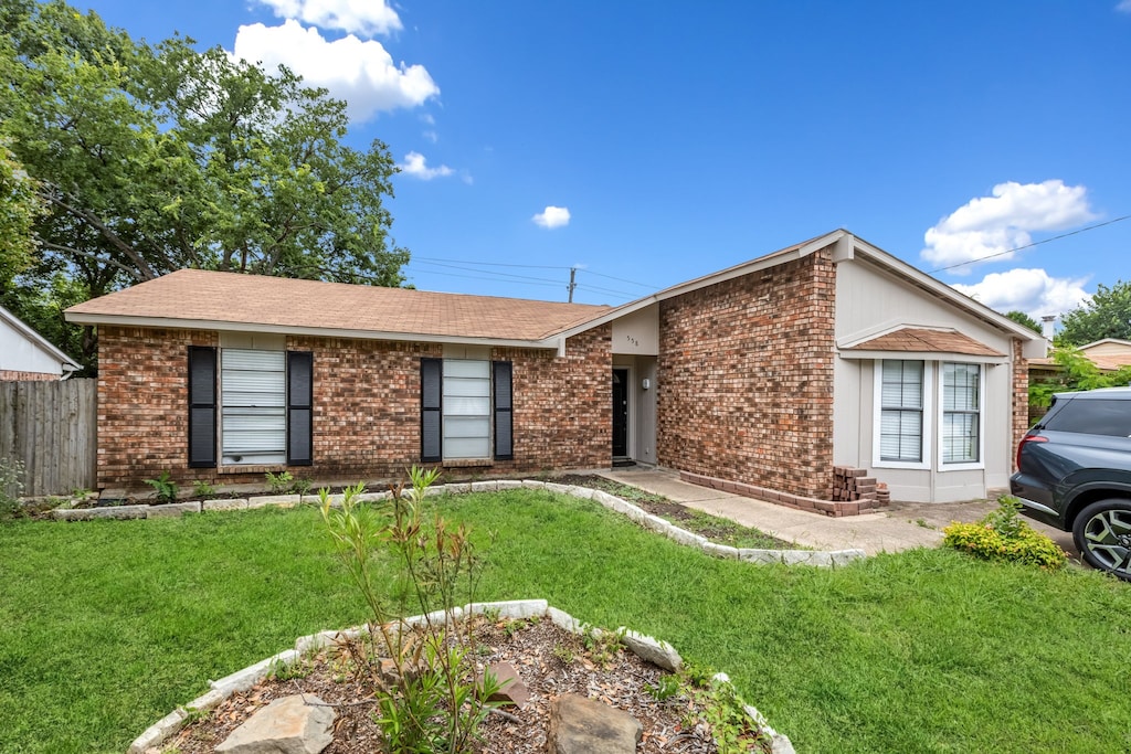 558 Ridgemont Dr, Allen, TX 75002 - view of front of house featuring brick siding and a shingled roof