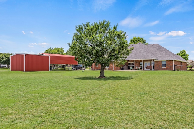 1329 E Highland Rd, Waxahachie, TX 75167 - view of grassy yard with an outbuilding