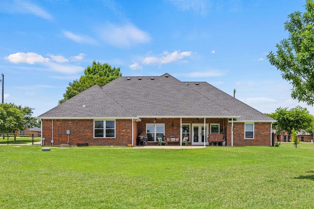 1329 E Highland Rd, Waxahachie, TX 75167 - rear view of property with french doors, roof with shingles, brick siding, and a patio