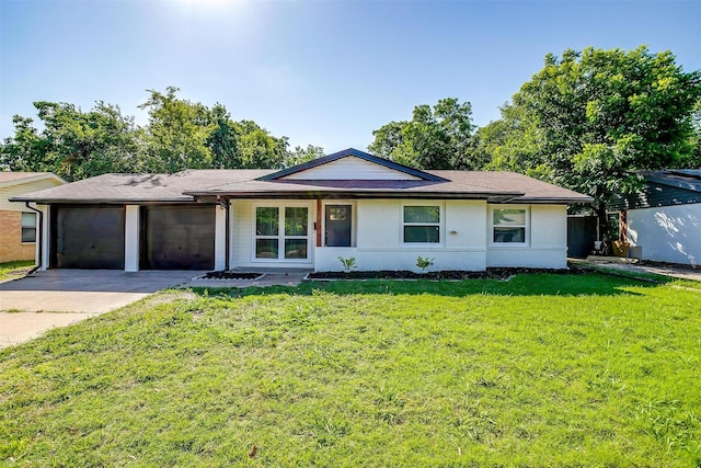 1909 Balla Way, Grand Prairie, TX 75051 - ranch-style home with an attached garage, concrete driveway, and a front lawn