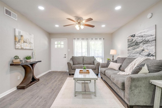 1909 Balla Way, Grand Prairie, TX 75051 - living room featuring wood finished floors, a ceiling fan, recessed lighting, and baseboards