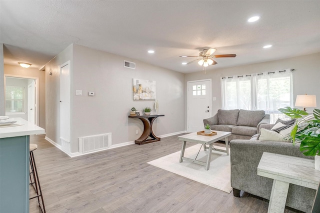 1909 Balla Way, Grand Prairie, TX 75051 - living area with a ceiling fan, light wood-style flooring, baseboards, and recessed lighting