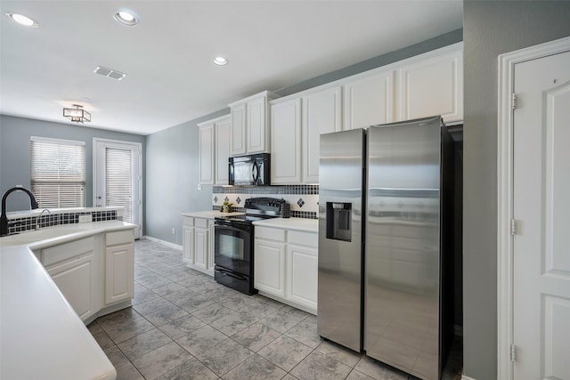 1635 Southwestern Dr, Allen, TX 75013 - kitchen with black appliances, a sink, backsplash, light countertops, and white cabinetry