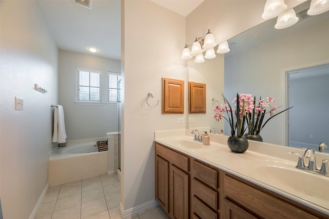 1635 Southwestern Dr, Allen, TX 75013 - bathroom with double vanity, baseboards, a garden tub, tile patterned floors, and a shower with shower door