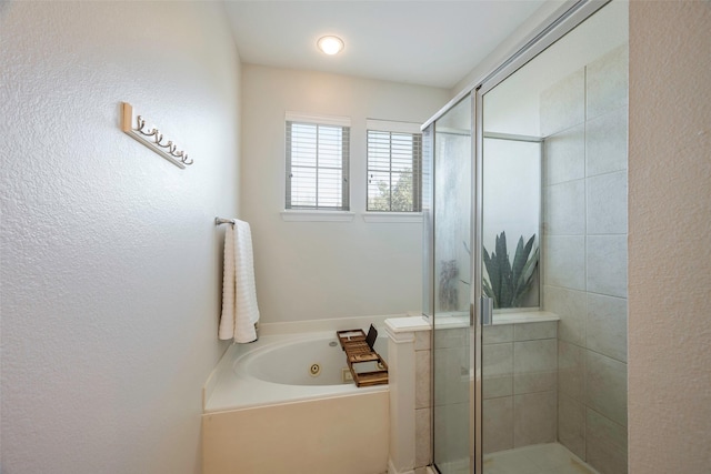 1635 Southwestern Dr, Allen, TX 75013 - bathroom featuring a jetted tub and a shower stall