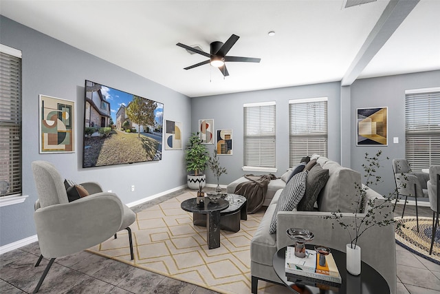 1635 Southwestern Dr, Allen, TX 75013 - tiled living area with ceiling fan and baseboards
