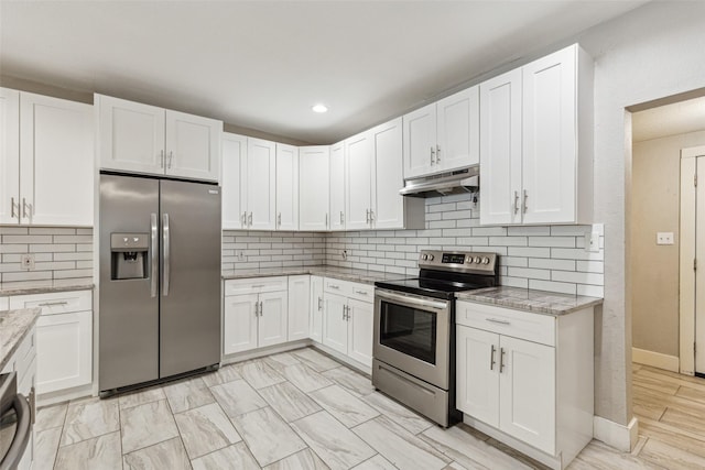 318 S Montreal Ave, Dallas, TX 75208 - kitchen with appliances with stainless steel finishes, under cabinet range hood, white cabinets, and recessed lighting