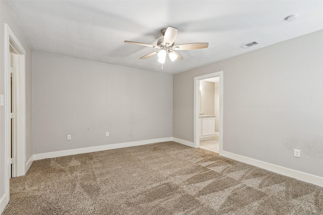 318 S Montreal Ave, Dallas, TX 75208 - empty room featuring ceiling fan, carpet floors, baseboards, and a smoke detector