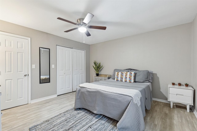 318 S Montreal Ave, Dallas, TX 75208 - bedroom with light wood-style floors, baseboards, a ceiling fan, and a closet