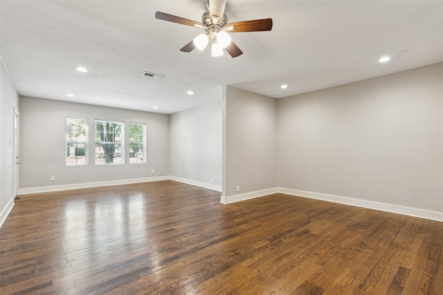 318 S Montreal Ave, Dallas, TX 75208 - spare room with dark wood-style flooring, ceiling fan, recessed lighting, and baseboards