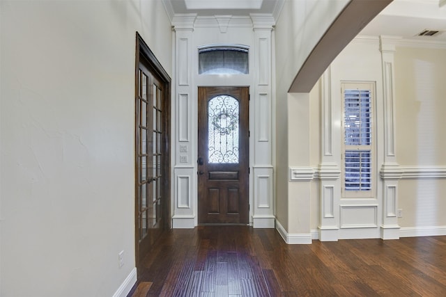 6520 Stone Creek Dr, North Richland Hills, TX 76182 - foyer entrance with wood finished floors, baseboards, and ornamental molding