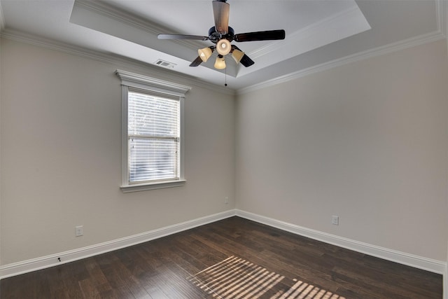 6520 Stone Creek Dr, North Richland Hills, TX 76182 - spare room with a raised ceiling, dark wood-type flooring, baseboards, and ornamental molding