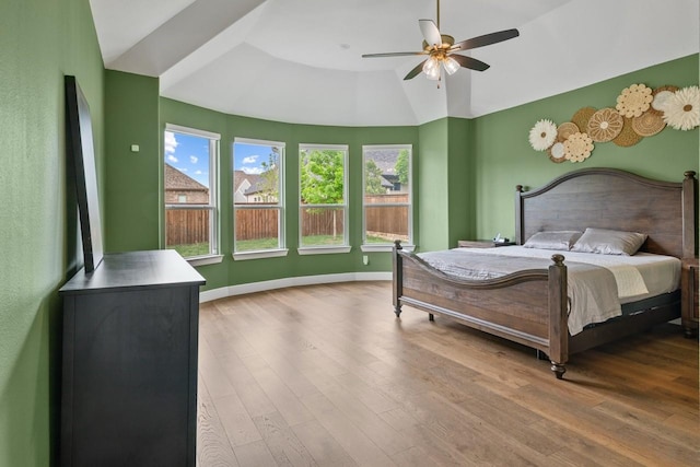 2104 Zaide Way, Celina, TX 75009 - bedroom featuring wood finished floors, ceiling fan, vaulted ceiling, and baseboards