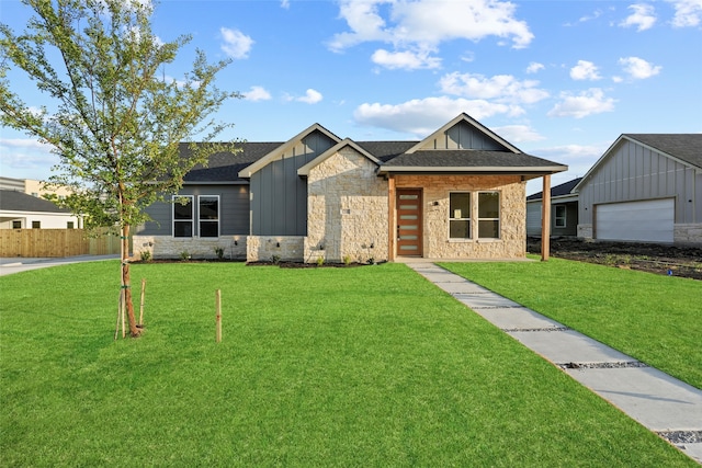 1218 Gannon Ln, Desoto, TX 75115 - view of front of property with board and batten siding, stone siding, and a shingled roof