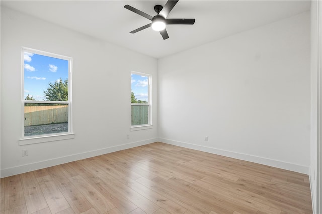 1218 Gannon Ln, Desoto, TX 75115 - unfurnished room with ceiling fan, baseboards, and light wood finished floors