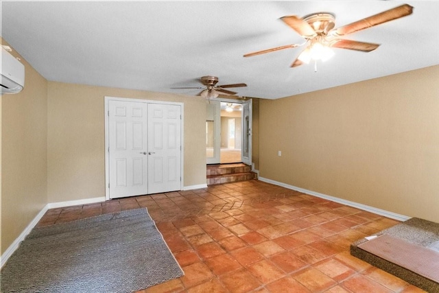 207 Mcmurry Ave, Duncanville, TX 75116 - unfurnished bedroom featuring a closet, a wall unit AC, and a ceiling fan