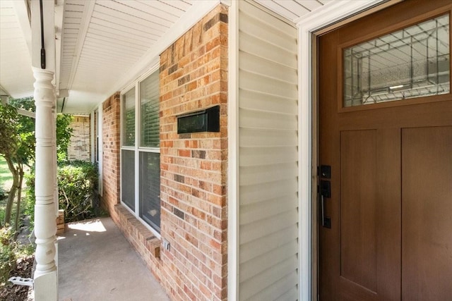 207 Mcmurry Ave, Duncanville, TX 75116 - property entrance featuring brick siding and covered porch
