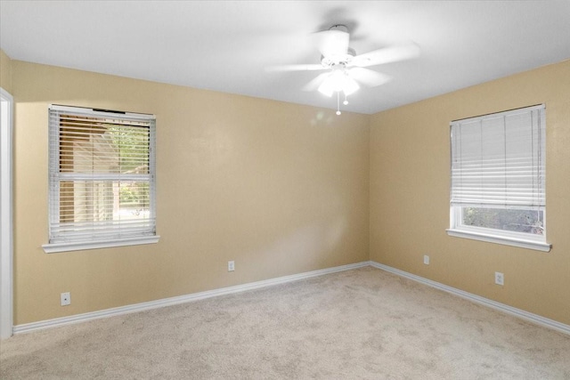 207 Mcmurry Ave, Duncanville, TX 75116 - spare room with carpet flooring, healthy amount of natural light, and ceiling fan