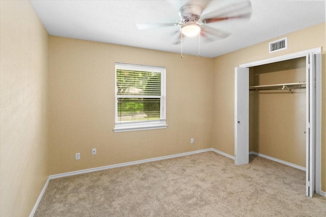 207 Mcmurry Ave, Duncanville, TX 75116 - unfurnished bedroom with carpet flooring, a closet, and ceiling fan