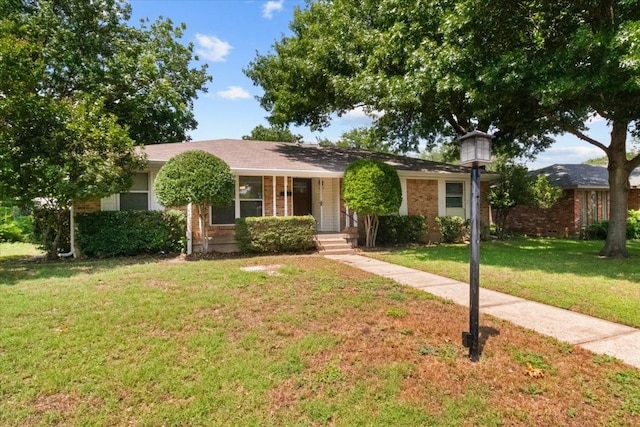207 Mcmurry Ave, Duncanville, TX 75116 - single story home featuring a front yard and brick siding