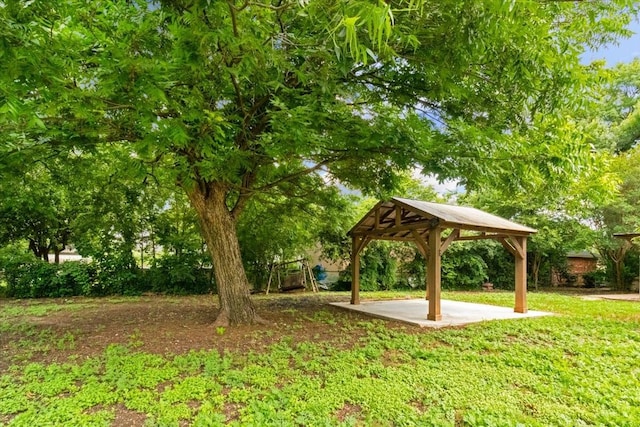 207 Mcmurry Ave, Duncanville, TX 75116 - view of green lawn featuring a gazebo