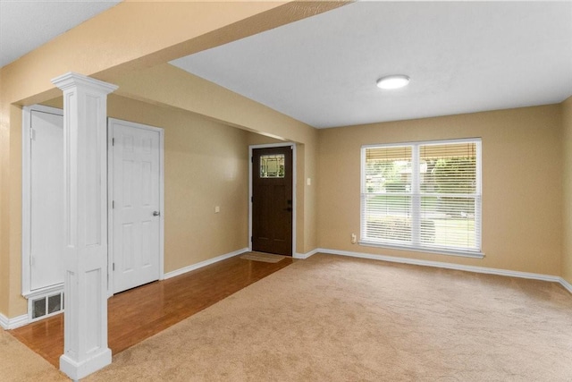 207 Mcmurry Ave, Duncanville, TX 75116 - foyer with carpet floors and ornate columns
