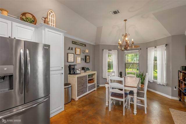 181 Bent Tree Loop, Haughton, LA 71037 - dining area featuring concrete floors, vaulted ceiling, a chandelier, and baseboards